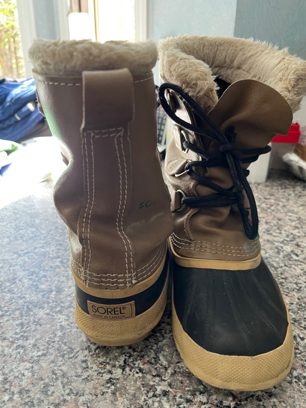 Sorel  Tan and Black Faux-Fur leather Winter Boots